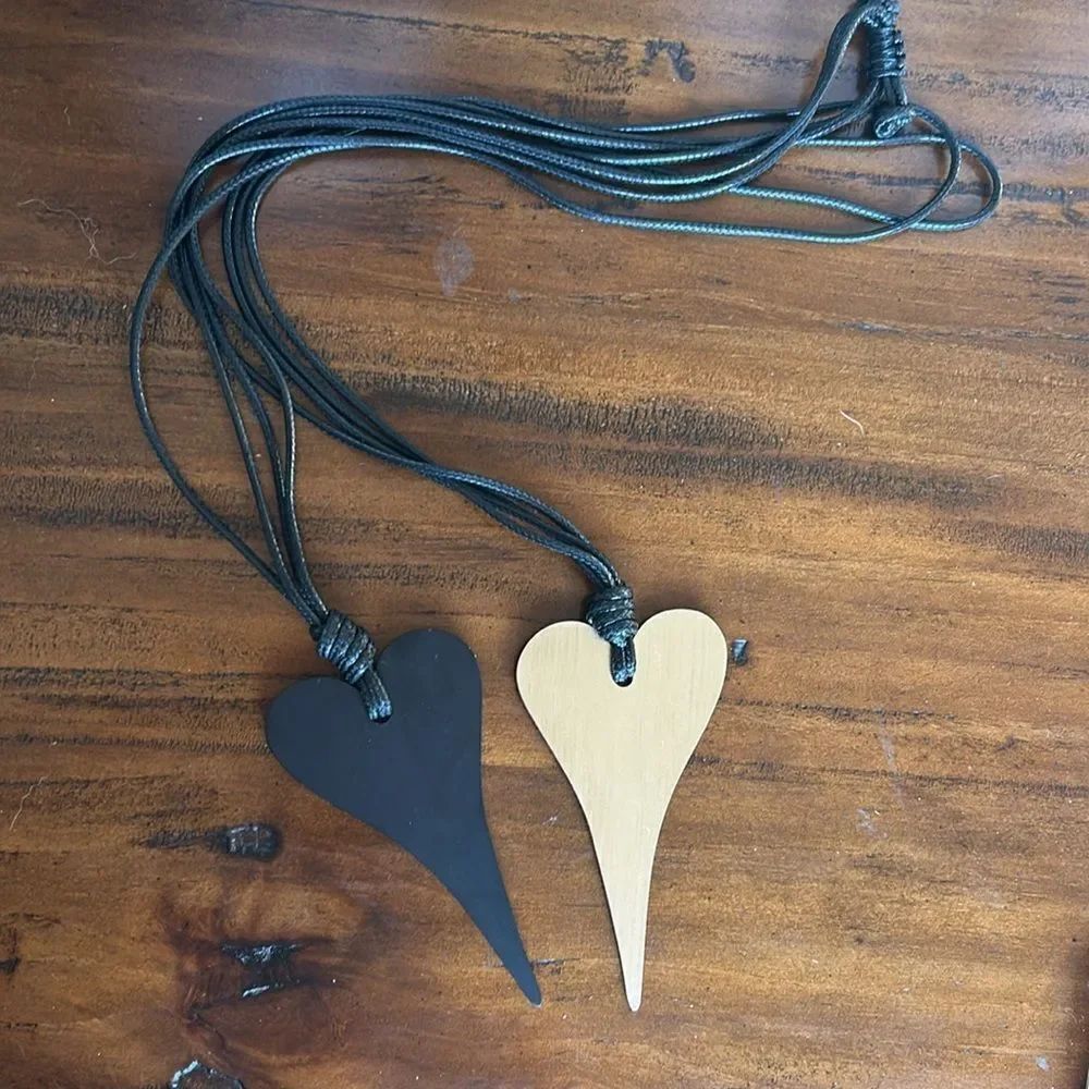 Fashion jewelry Faux leather necklace with heat pendant NWOT